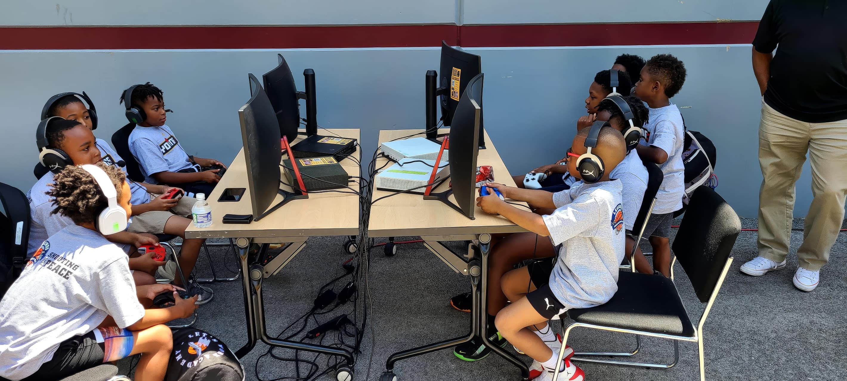 Broadcast lab—student on mic with production station